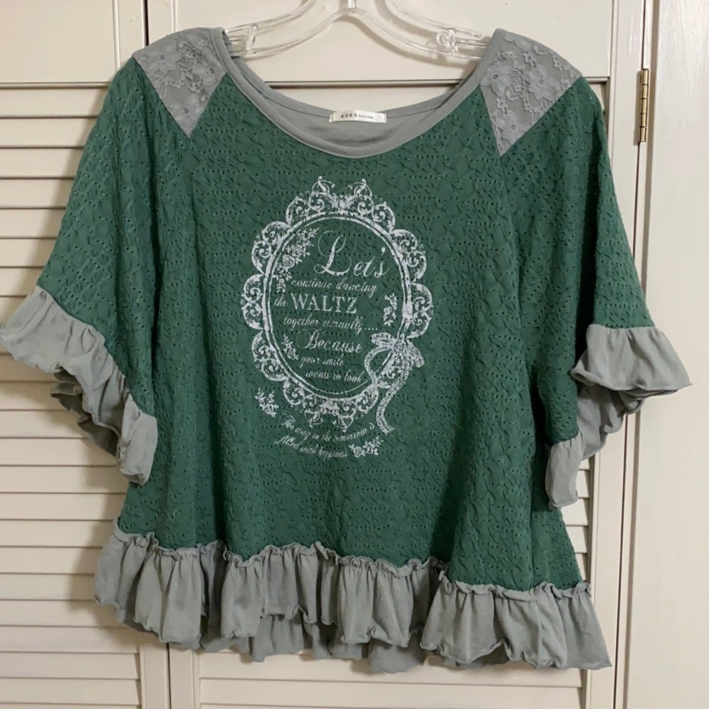 Adorable Axe Femme lace ruffle top